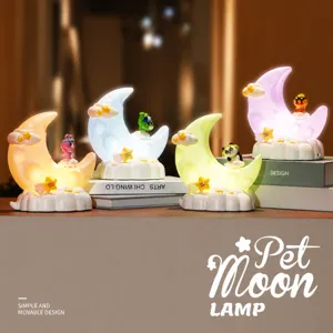 Cartoon pet moon lamps in four colors pink white green and orange on cloud bases