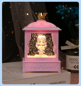 Close-up of pink princess crown night light with character and glittery dreamlike detail