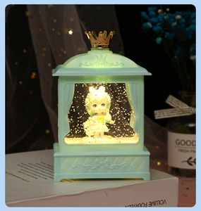 Mint green crown lantern night light with cartoon figurine and gold star background