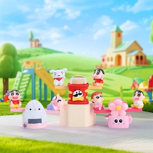 Detailed close-up of Crayon Shin-chan blind box figures on colorful amusement park bases