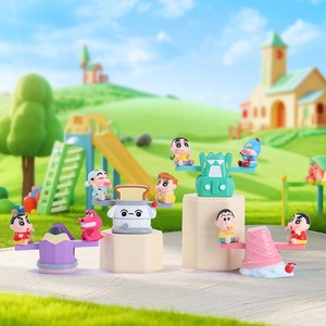 Macro detail of Crayon Shin-chan cartoon figures on balanced seesaw toy bases