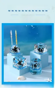 Detail of crystal whale desk organizer and pen holder with 3D ocean wave carvings