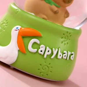 Cute green Capybara crystal ball night light base with decorative pelican relief