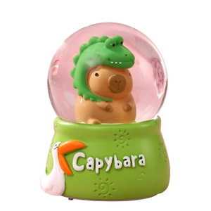 Luminous Capybara crystal ball night light with green dinosaur hat and liquid globe