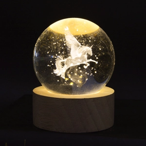 3D laser engraved crystal ball night light with Pegasus and a warm wooden LED base