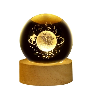 3D laser engraved glowing crystal ball with wooden LED base featuring a galaxy design