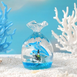 Ocean themed sensory liquid hourglass with double dolphins and surfboard inside bag shape