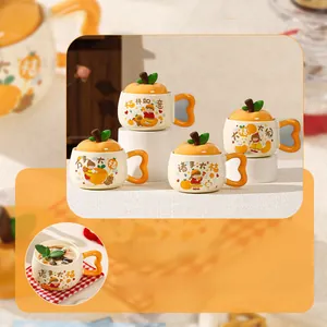 Detailed view of ceramic mug with orange-shaped lid and green leaf handle detail