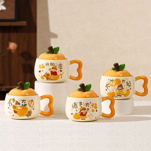Set of four ceramic mugs with orange-shaped lids and orange heart-shaped handles