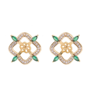 Elegant gold clover earrings with green gemstones and white micro-set zircon accents