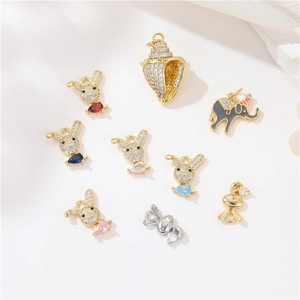Pendentifs bijoux DIY avec lapins et éléphants dorés et pierres de zircone colorées