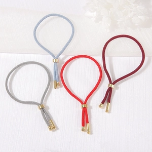 Adjustable braided rope bracelets in four colors with gold sliding metal buckles