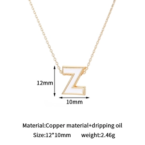 Minimalist copper letter Z pendant necklace with white enamel and golden border