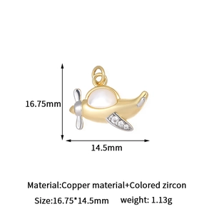 Airplane pendant with gold and silver tones and zircon wings, size 16.75 by 14.5mm