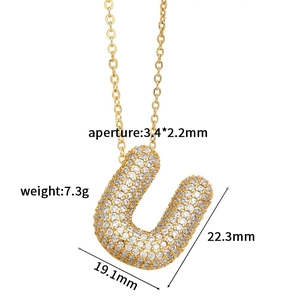 Detailed specs of gold U-shaped initial pendant with pavé cubic zirconia and cross chain