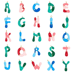 Colorful enamel alphabet pendants set with gold rings in vibrant dopamine pop style