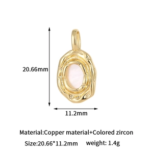 Detailed size chart for golden oval charm with mother-of-pearl inlay and hammer texture