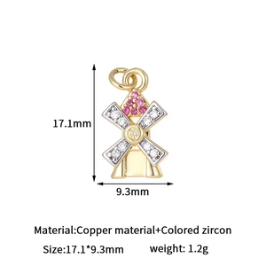 Detail of copper windmill charm with pink and white zircon stones in 17.1x9.3mm size