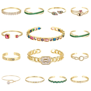 Set di dodici bracciali rigidi dorati geometrici con cuore e zirconi per donna