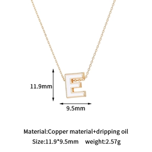 Detail view of 14K gold plated letter E pendant with dimensions 11.9mm by 9.5mm