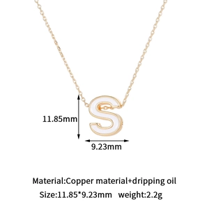Detail view of 14K gold plated letter S pendant with dimensions 11.85mm by 9.23mm