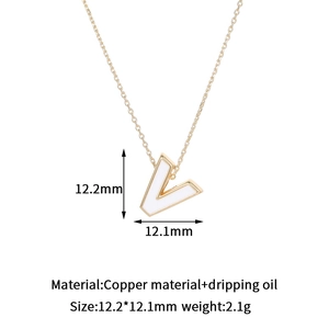 Detail of 14K gold plated V-letter pendant with dimensions 12.2mm and 12.1mm