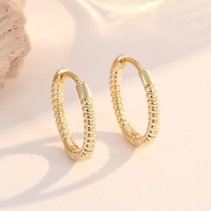 Elegant 14K gold twisted chain hoop earrings with a secure hinge clasp for women