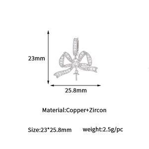 Detail of zircon-encrusted butterfly pendant with precise 23x25.8mm size measurements