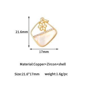 Macro shot of 21.6mm gold-plated copper pendant with zircon and shell inlay details