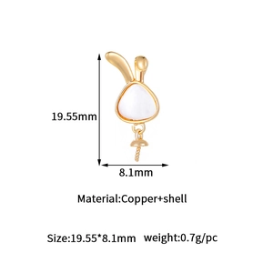 Macro shot of 19.55mm rabbit ear pendant made of gold-plated copper and white shell