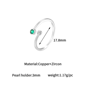 Detail of adjustable copper ring with 17.8mm diameter featuring green and white zircons