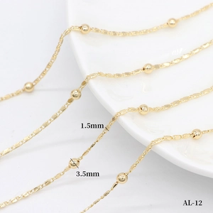 Macro view of 14k gold-plated ball chain with 1.5mm width and 3.5mm bead diameter