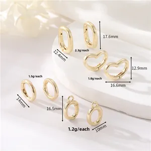 Λήψη macro από χρυσά κουμπώματα 14K σε σχήμα καρδιάς και οβάλ με ακριβείς διαστάσεις