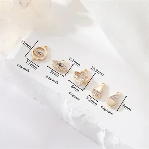Detailed size chart for 14K gold-plated Evil Eye and Clover zircon charms and pendants