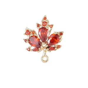 Golden maple leaf pendant with red zircon stones and a circular ring for DIY jewelry