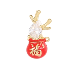 Lucky bag pendant with pearl and ghost horn design in red enamel and gold plating