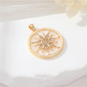 14K gold plated circular starburst pendant with white shell and zircon inlay