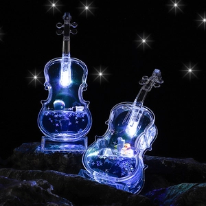 Luminous blue violin night light with galaxy landscape and spacecraft inside the resin