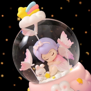 Cute musical crystal ball featuring a sleeping fairy and rabbit on a pink cloud base