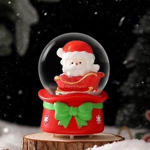 Luminous Santa Claus snow globe on wood stump with a festive Christmas forest backdrop