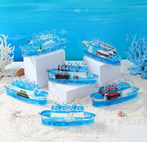 Detailed view of cruise ship fluid paperweight with blue liquid and floating ocean theme