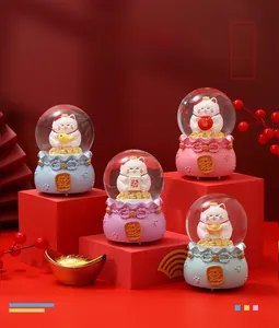 Set of four festive lucky cat crystal balls with traditional Chinese blessings and glitter