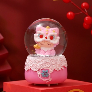 Pink lucky cat crystal ball with lion dance figure and festive red berry background