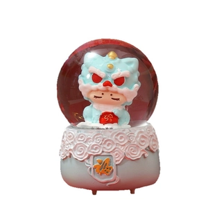 Traditional lucky lion dance crystal snow globe with red blessing bag and Fu character base