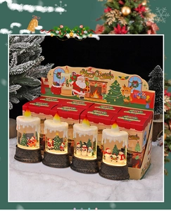 Detail of Christmas LED candle water globes with Santa and snowman scenes in a gift box