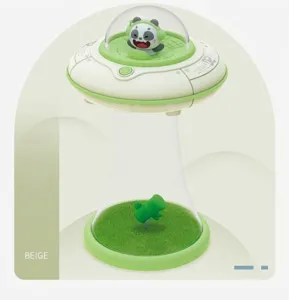 Detail of UFO-shaped panda night light featuring a beige and green frosted finish