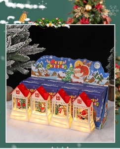 Close-up of assorted LED Christmas lanterns featuring Santa and snowman holiday scenes