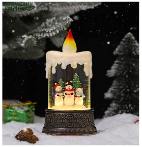 Close-up of LED Christmas lantern with snowmen inside and warm bronze finish