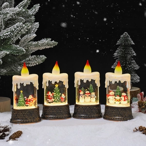 Set of four Christmas candle lanterns with Santa and snowman scenes and LED flames