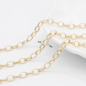 Détail macro de chaîne à maillons ovales en laiton plaqué or 14K pour bijoux DIY